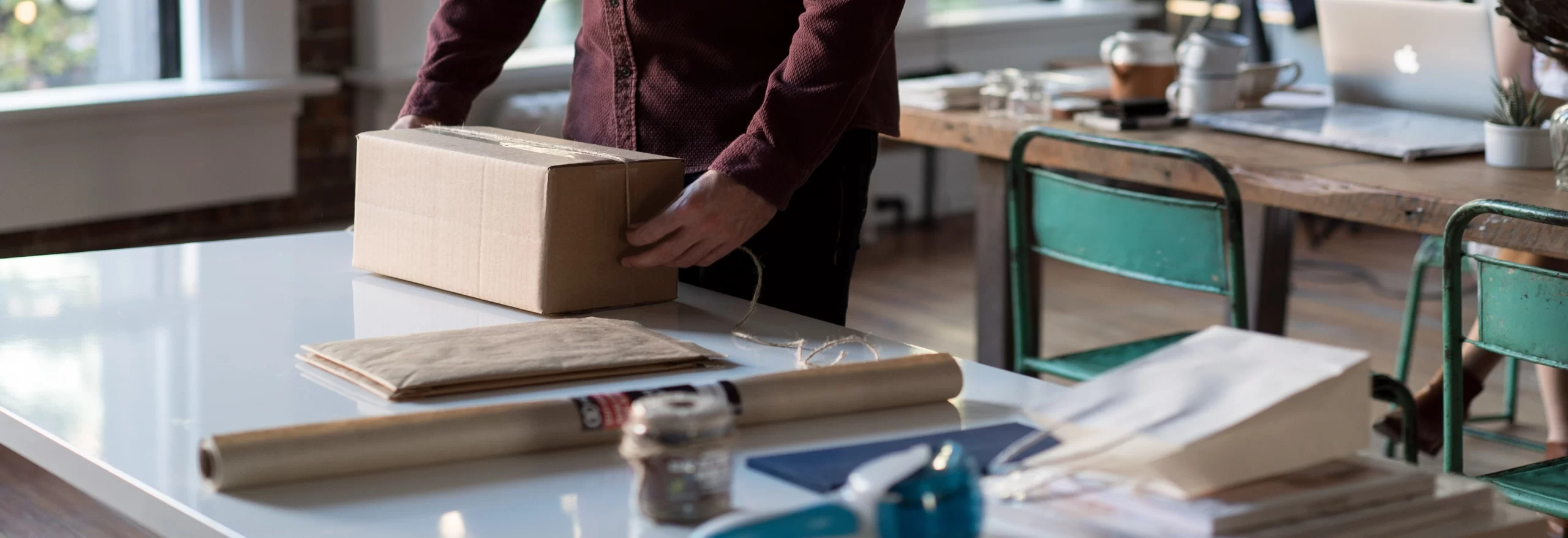 A man is delivering a package for e-commerce.