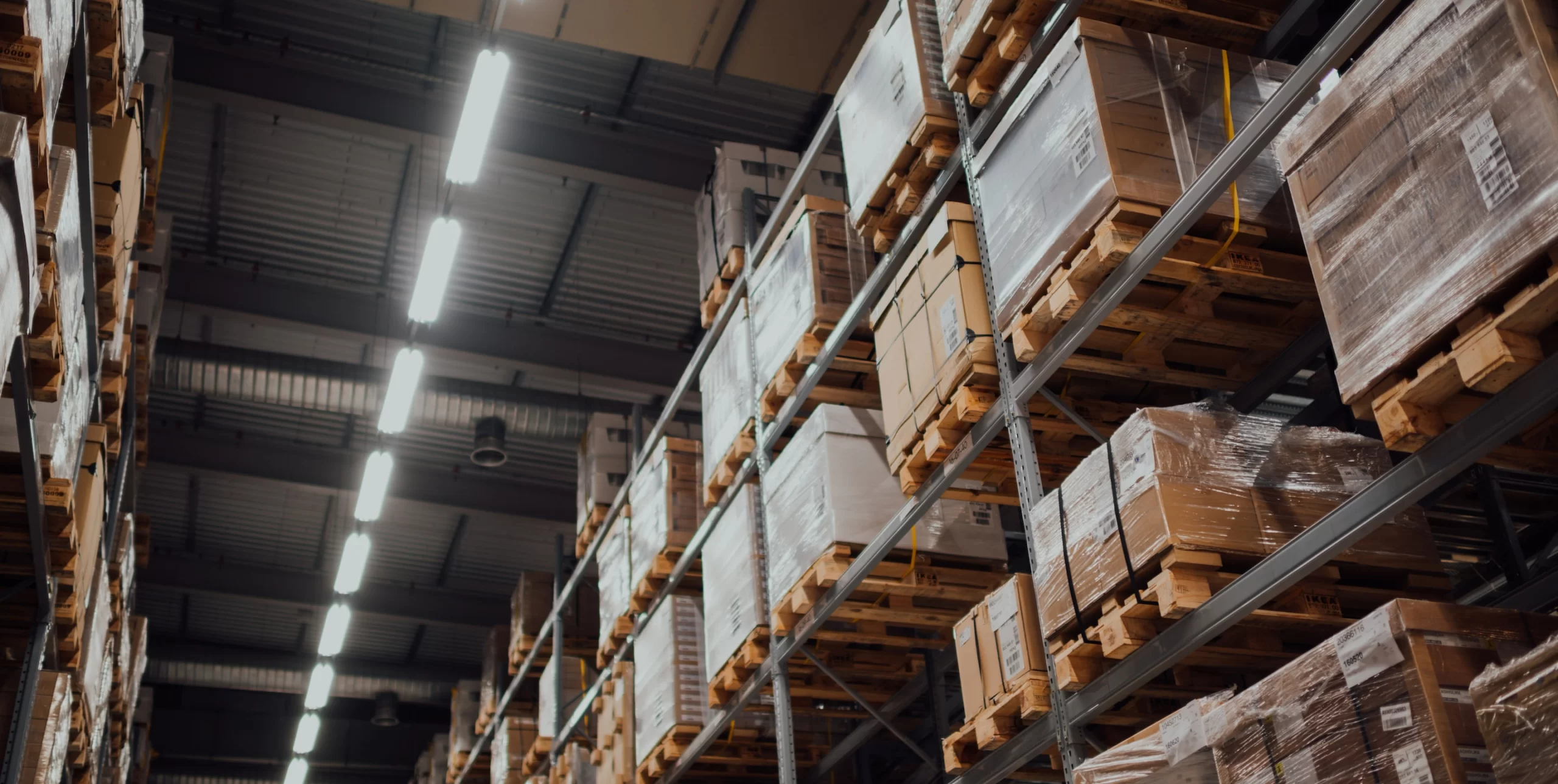 A customs warehouse filled with pallets and boxes.